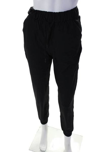 Lululemon Womens Ruffles Hem Tapered Ribbed Ankle Drawstring Pants Black Size 2
