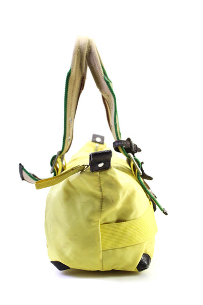 Un Apres-Midi De Chien Womens Zipped Buckled Strapped Barrel Handbag Yellow