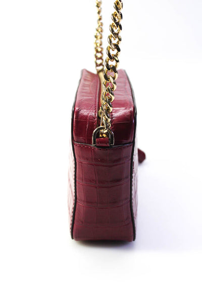 Michael Kors Womens Small Embossed Leather Tassel Crossbody Handbag Magenta