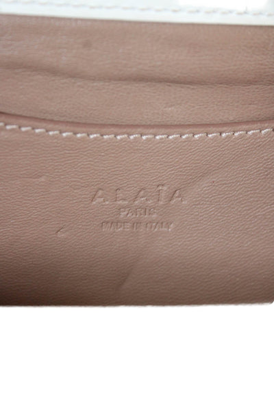 Alaia Womens Patent Leather Laser Cut Wristlet Clutch Handbag White