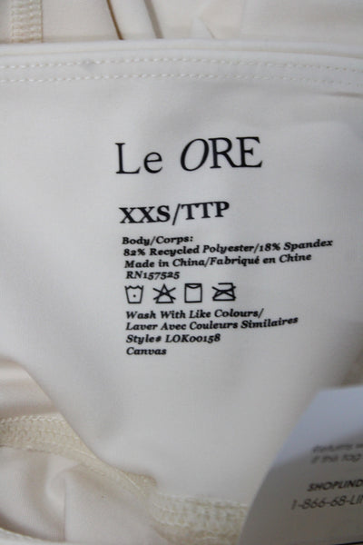 Le Ore Womens Ivory Ankle Leggings Athleisure 82% Recycled Polyester Size 2XS